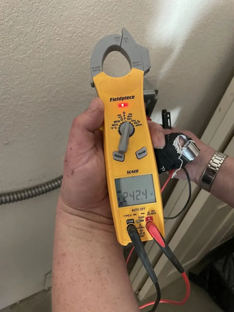Voltage testing with clamp meter during Generator Installation in Kent